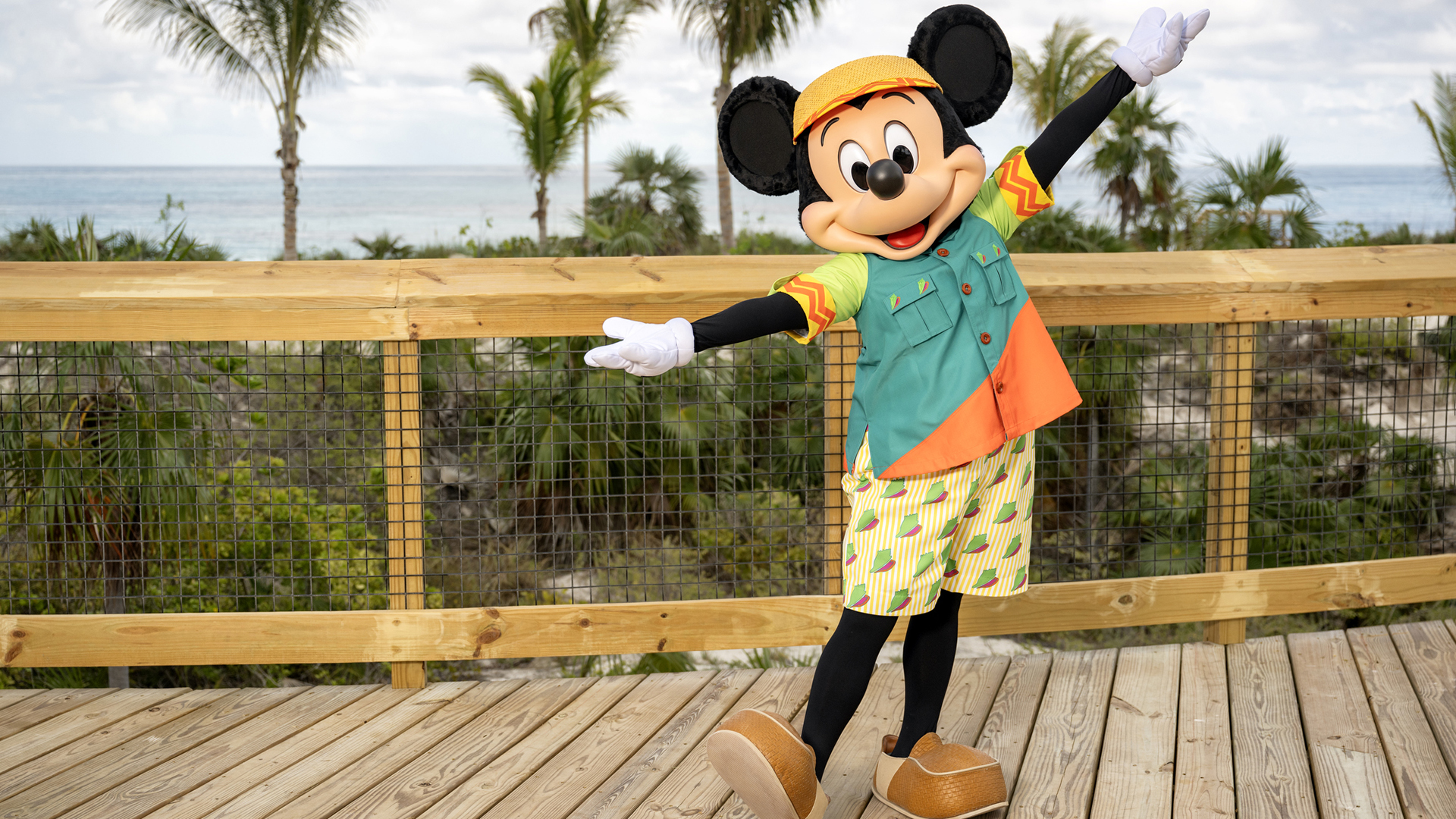 Mickey and Minnie Mouse greeting guests at Disney's private island