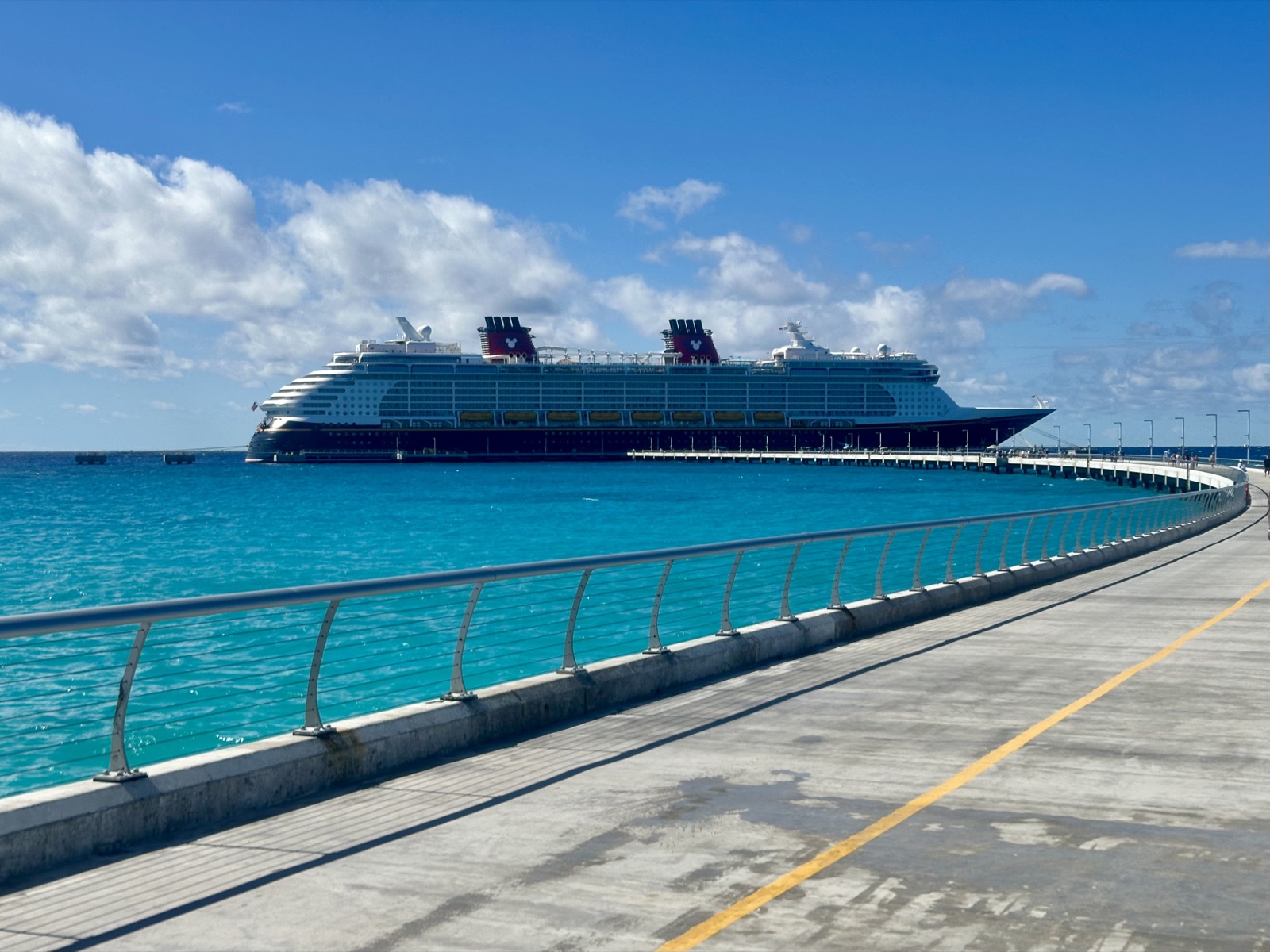 The Disney Dream docked at the pier at Disney Lookout Cay at Lighthouse Point in the Bahamas