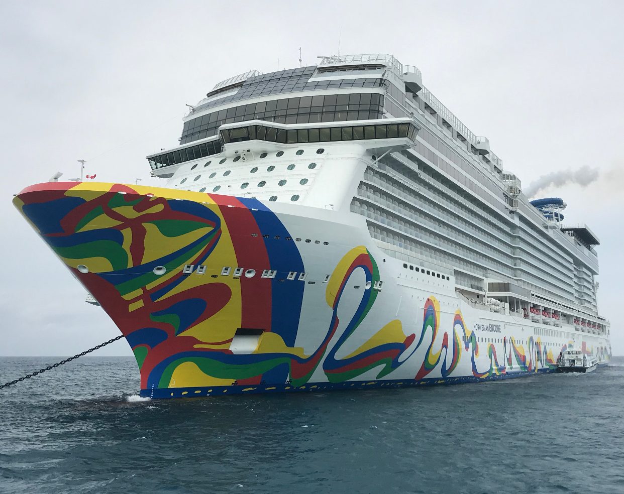 Norwegian Encore cruise ship with its colorful hull artwork at sea