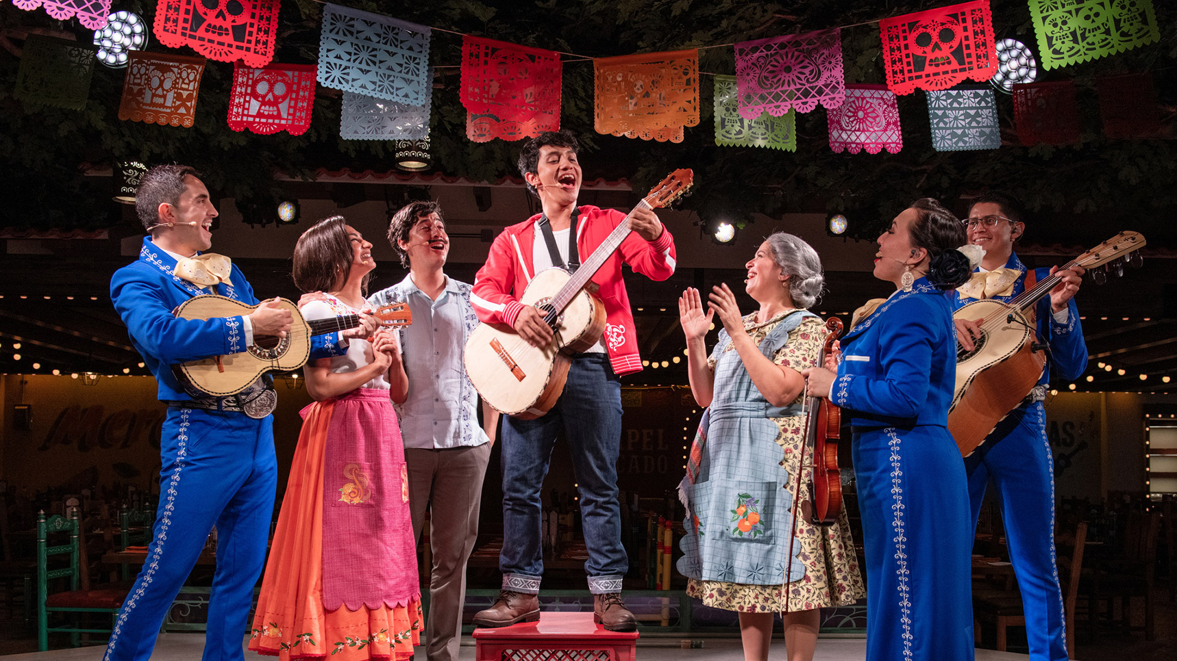 Vibrant Disney cruise restaurant Plaza de Coco with colorful decor